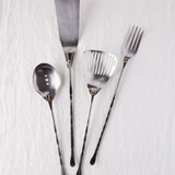 4-Piece Serving Set in Stainless Steel. Spatula, Strainer Spoons and Fork